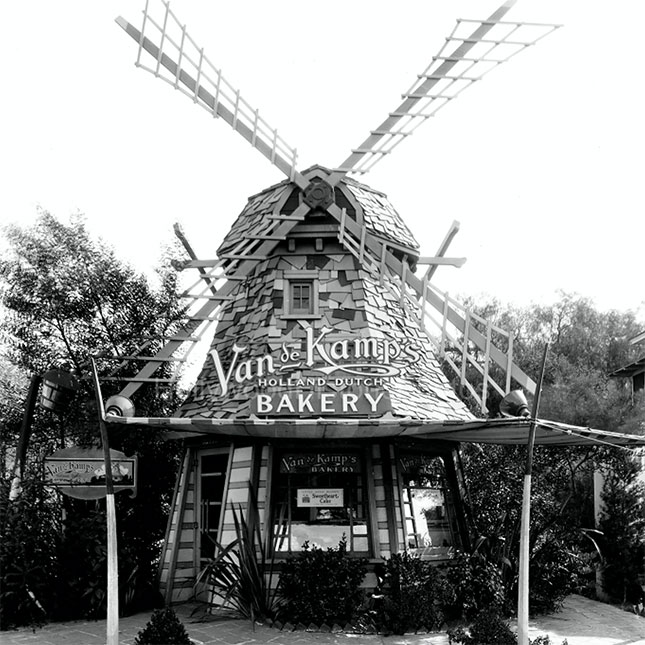 Vintage photo of a whimsical Dutch windmill that was the storefront for Van de Kamp's bakery.