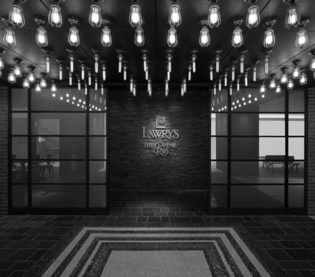 The glamorous entrance to Lawry's Ebisu with dramatic lighting and lush carpets.