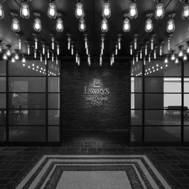 The glamorous entrance to Lawry's Ebisu with dramatic lighting and lush carpets.