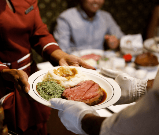 Serving prime rib at Lawrys Steakhouse
