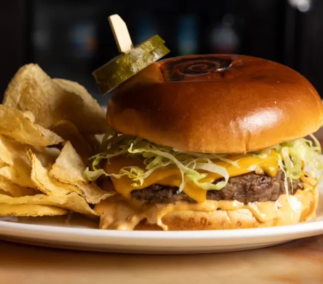 ½ lb Certified Angus Beef Lawry's Burger with New School American cheese and Vintage Sauce at Lawry's The Prime Rib Las Vegas